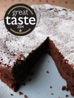 Award-winning flour-free chocolate and prune truffle cake, made with organic, gluten-free and dairy-free ingredients, and Appleton rum