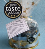 A gold star winner at the Great Taste Awards 2011: Gluten free Luxury Jamaica Christmas Cake, moist, rummy and rich, made with finely chopped organic fruit soaked in Appleton Jamaica Rum. No added sugar. Comes unadorned, but I can add marzipan and/or icing if you prefer. By post to UK and abroad, or collect in London. London delivery also available. Other gluten-free rich fruit cakes for Christmas: Traditional Luxury glutenfree Xmas Cake, made with organic fruit steamed in Appleton Rum. Topped with organic marzipan, or covered with marzipan and iced. Delivery or collection in London, or by post to UK and abroad. 