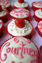 Gluten free, lactose free Strawberry Cupcakes, with soya cream cheese topping and fresh strawberries. All ingredients gluten-free and dairy-free