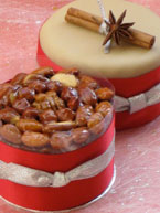 Delicious luxury Christmas Cakes, gluten-free. Moist and dark, these rich fruitcakes are made with organic fruit and nuts steamed in Appleton Jamaia rum. Sweetened with organic blackstrap molasses, no added sugar. You can choose from marzipan topping, all-over marzipan with or without soft white icing, or glazed nut & dark cherry topping. These exquisite gluten free cakes are perfect as a Christmas gift, or for sharing with family & friends. Delivered by post in the UK and abroad. Collection or delivery by hand in London available. 