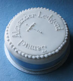 This beautiful glutenfree Fruit Cake can be posted to UK addresses and abroad and delivered by hand in London. Moist and dark, it is made with organic fruit and toasted almonds steamed in Appleton Jamaia rum. Sweetened with organic blackstrap molasses, no added sugar. Covered with marzipan and soft white icing, and finished with a piped message. Gluten free. This luxury fruitcake is perfect for your celebration, for sharing with family and friends