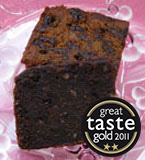 Choose from five scrumptious gluten free fruit cake recipes, including three Great Taste award winners. All made with organic fruit and Appleton Jamaica Rum: Great Taste award-winning Luxury Jamaica Fruit Cake – dark, silky-smooth, made with finely chopped fruit macerated in rum. Or Luxury Fruit Cake, made with fruit steamed in rum, and toasted almonds. I use the same mix for my Luxury Fruit Cake with Dark Rum Frosting, awarded a Great Taste star in 2020. My award-winning Marzipan Fruit Cake is made with dried pears and chunks of organic marzipan. And my Luxury Vegan Fruit Cake has added Bramley apples and ground almonds. All are moist and lightly sweetened, so you can really taste the fruit. All ingredients gluten-free. Jamaica Cake, Marzipan Cake and Vegan Cake are also dairy-free