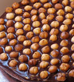 Gluten-free dinner party desserts: Try a Torta alla Gianduja, a gluten free truffle cake made with organic dark Fair trade chocolate, organic ground hazelnuts and hazelnut liqueur, topped with dark chocolate ganache and roasted organic hazelnuts. Or a Reine de Saba, a glutenfree chocolate and almond cake made with organic dark Fairtrade chocolate, organic ground almonds and Appleton Jamaica Rum, with a dash of almond essence. Covered in dark chocolate ganache. Can be decorated with crystallised roses, chocolate-covered coffee beans, or other decoration. Perfect as a dessert served on its own or with berries and cream. Delivery in London