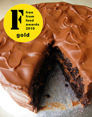 This deliciously damp chocolate cake (gluten free, dairy free, vegan) won Gold at the 2019 FreeFrom Food Awards. It's made with organic ingredients, including Fairtrade cocoa powder, extra-virgin olive oil, ground almonds and Madagascar vanilla. Keeps well and improves with age. All ingredients gluten-free and dairy-free, no animal ingredients