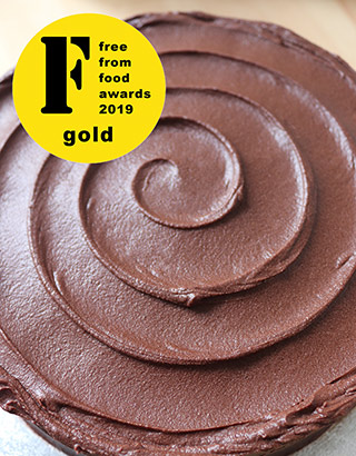 Awarded Gold at the FreeFrom Food Awards 2019, this luscious chocolate cake is divinely soft & moist. Layered with dairyfree 'cream cheese' mocha chocolate frosting, it's irresistible! All ingredients egg free, gluten free, dairy free, no animal products