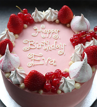Gluten free celebration cakes – all shapes and flavours. This one is a Madagascar vanilla cake, filled with strawberry buttercream, and decorated with berries and meringue kisses. All ingredients gluten-free. Vegan and dairy-free also available