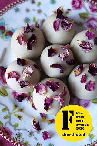 For Valentine's Day: fabulous gluten-free, dairy-free vegan bonbons: Rose & Pistachio Cake on the inside, organic dairy-free white chocolate outside. Sprinkled with organic rose petals