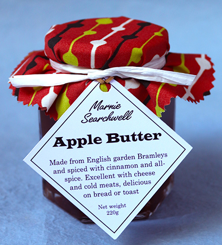 Apple Butter: Adapted from a traditional American recipe: made with organic Kentish Bramley apples, spiced with freshly ground cinnamon, cloves and allspice. My kids love this on toast, or with cheese. Finished with a fabulous fabric topper tied with paper ribbon 