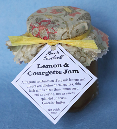 Lemon & Courgette Jam: Made with organic lemons and unsprayed allotment courgettes, this is nicer than lemon curd – not cloying, nor as sweet: splendid on toast. Contains butter. Finished with a fabulous fabric topper tied with paper ribbon 