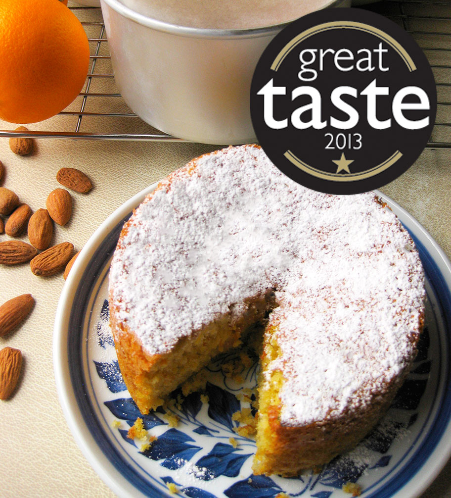 This moist Tunisian Orange & Almond Cake is a Great Taste Award winner. Made with organic ground almonds, oranges and extra-virgin olive oil. Made with 100% gluten-free and dairy-free ingredients