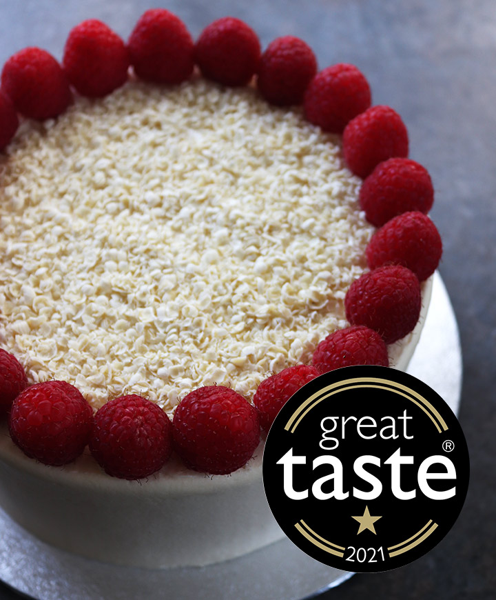This tender, moist white chocolate cake, is a Great Taste award winner. Made with buttermilk, organic white chocolate and raspberries. All ingredients gluten-free