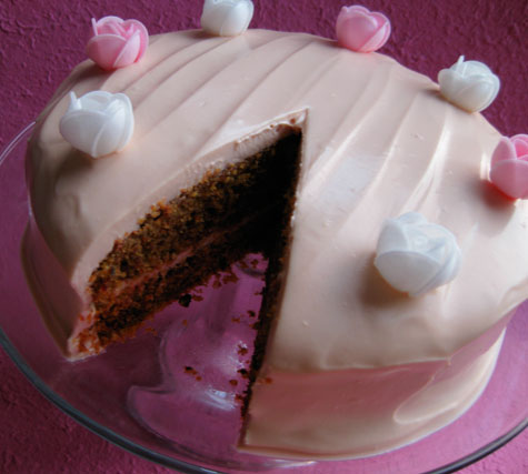 This gorgeous gluten-free, lactose-free cake is made with organic chopped, roasted hazelnuts and freshly grated beetroot and spiced with nutmeg, cinnamon and ginger. With a lactose-free cream cheese frosting and finished with rice-paper roses. Gluten free and lactose free. Delivery in London 